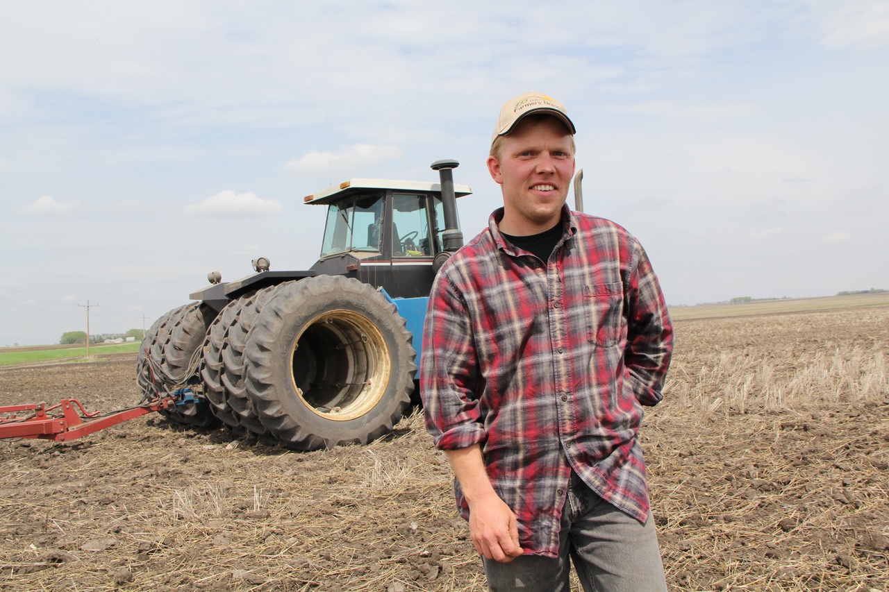 a farmer with his tractor
